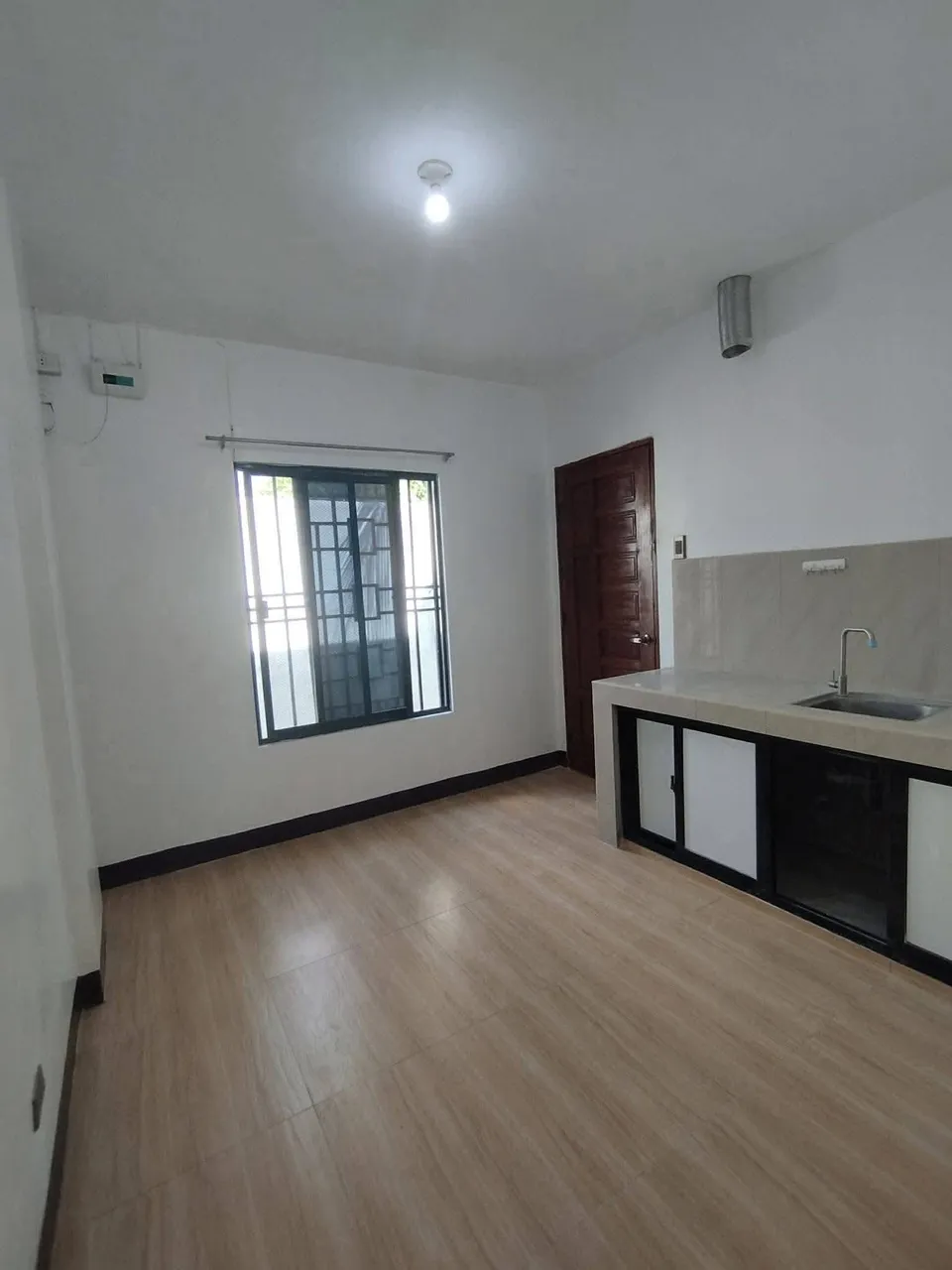 2-BR Apartment with Split-Type AC in Pioneer Village, Lagao