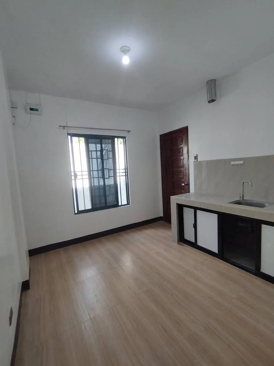 2-BR Apartment with Split-Type AC in Pioneer Village, Lagao